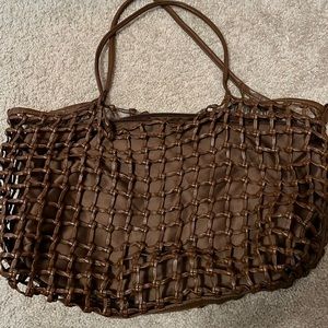 Anthropologie bag missing side tassels